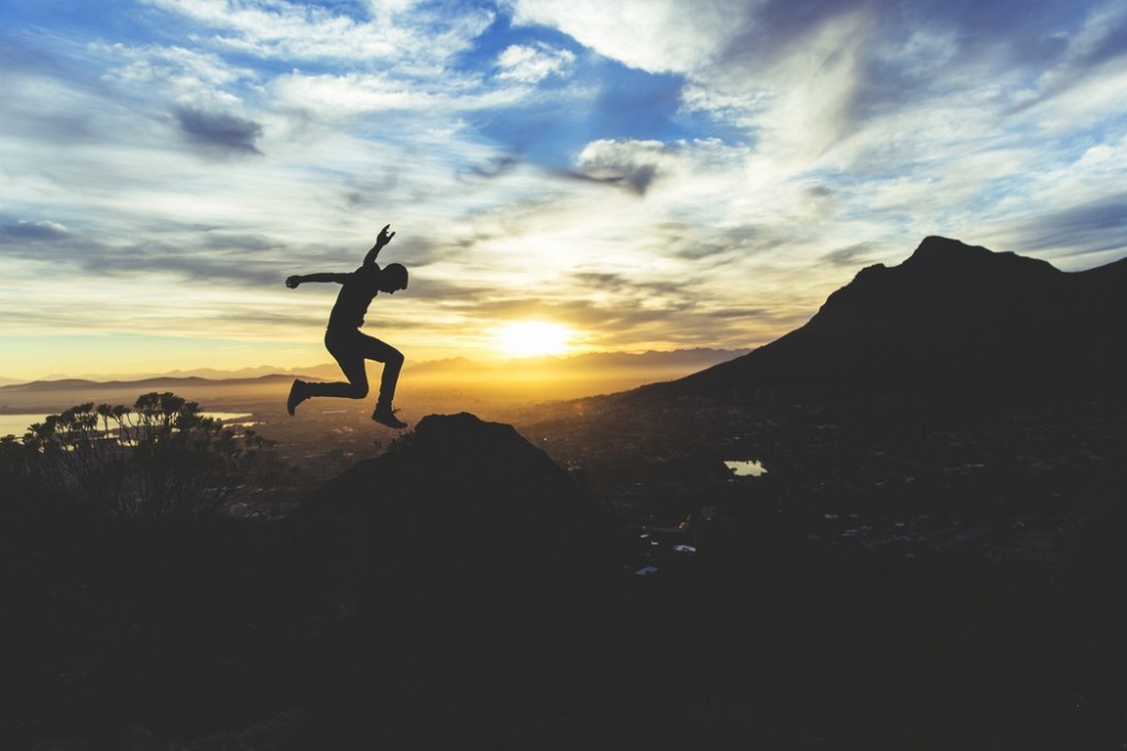 jumping sunset unsplash