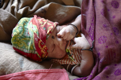 3 day-old baby boy in Dibana village, Maharastra, India.   